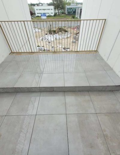 Terrasse accessible dalles grès cérame sur plot